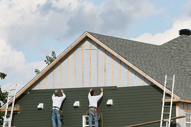 Professional Siding Replacement technician working in Ellwood City, PA